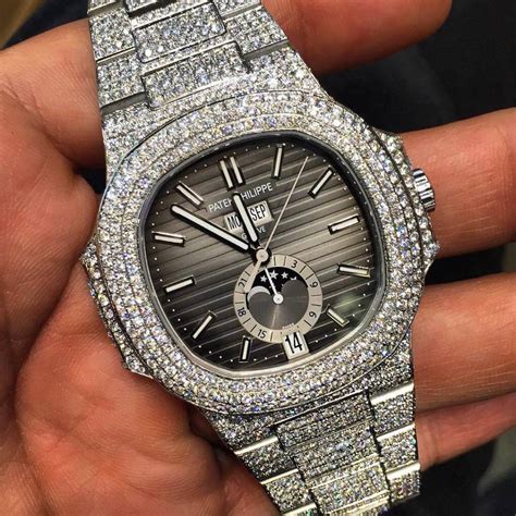 iced out patek philippe nautilus|Patek Philippe Nautilus diamond bezel.